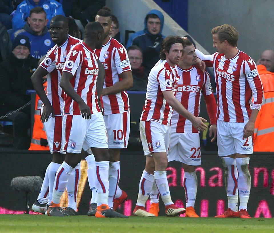  The Swiss international celebrates with his team-mates after netting his seventh goal of the season