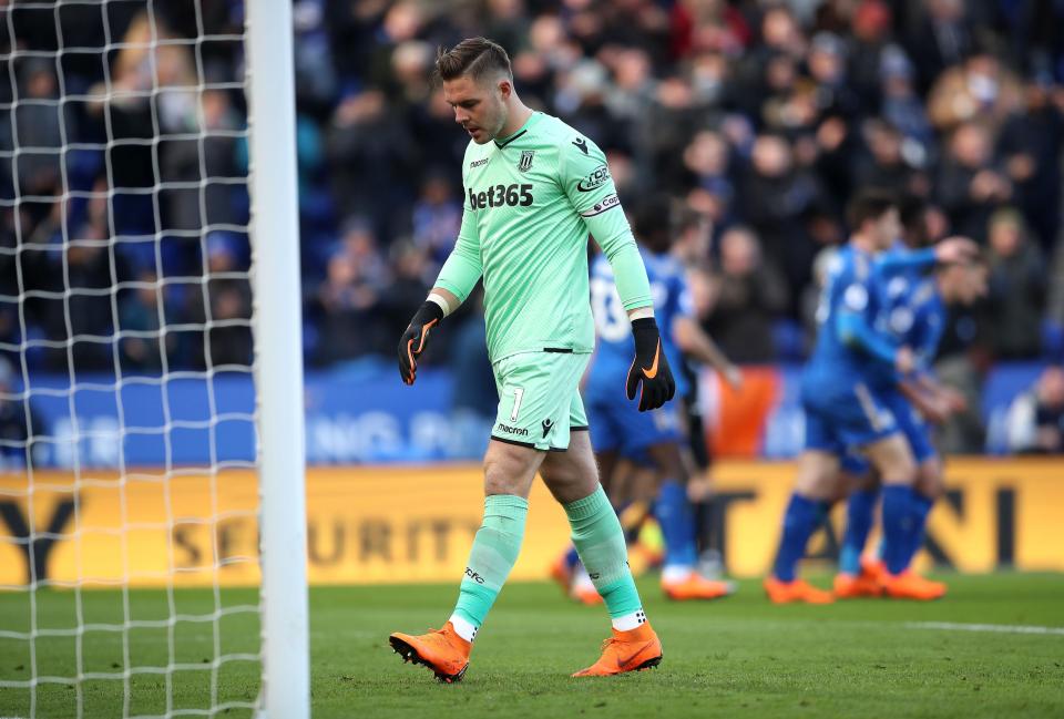  Jack Butland walks to pick the ball out of his own net after calamity own goal