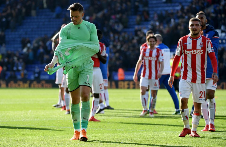  Jack Butland looks dejected as he and Stoke team-mates leave King Power pitch