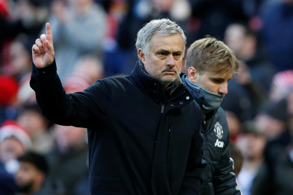  Jose Mourinho salutes Old Trafford crowd after Chelsea win