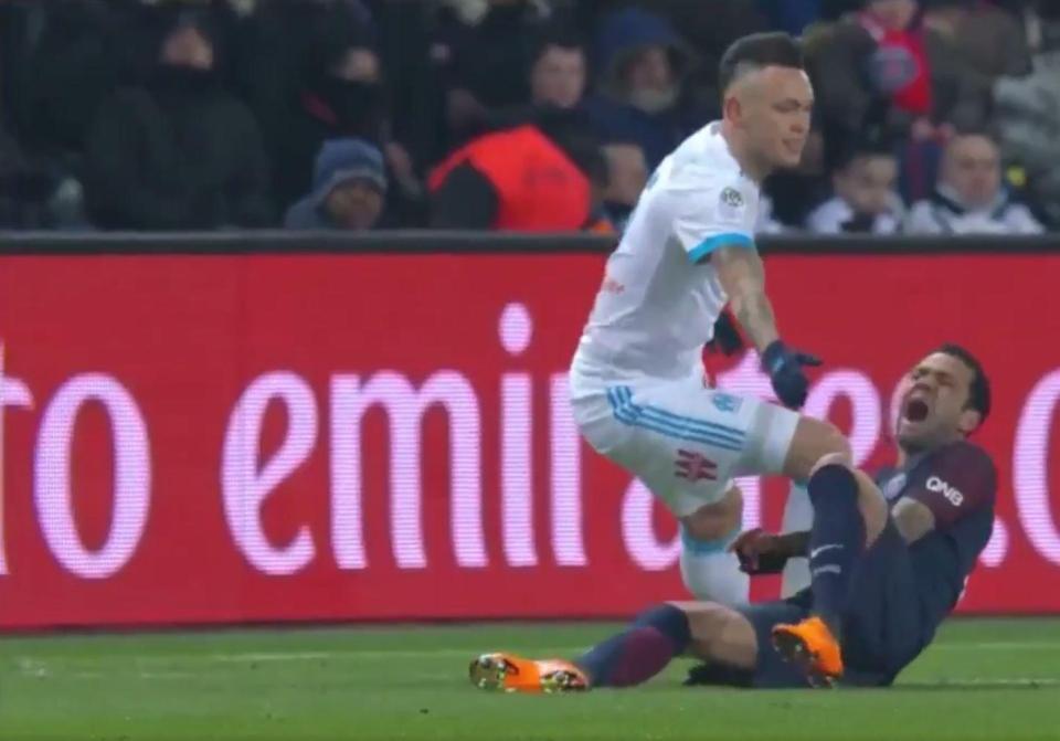  The Brazilian was left crumpled in a heap clutching his ankle in agony after Lucas Ocampos' tackle