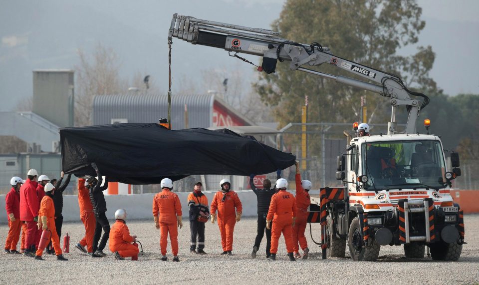  Finally we have lift-off as Alonso's car is taken back to the pits