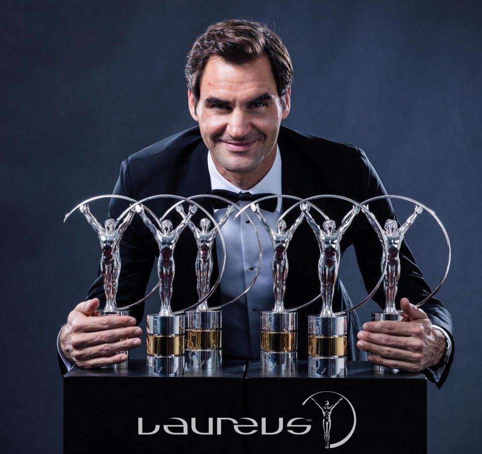  Tennis player Roger Federer holds his six Laureus World Awards