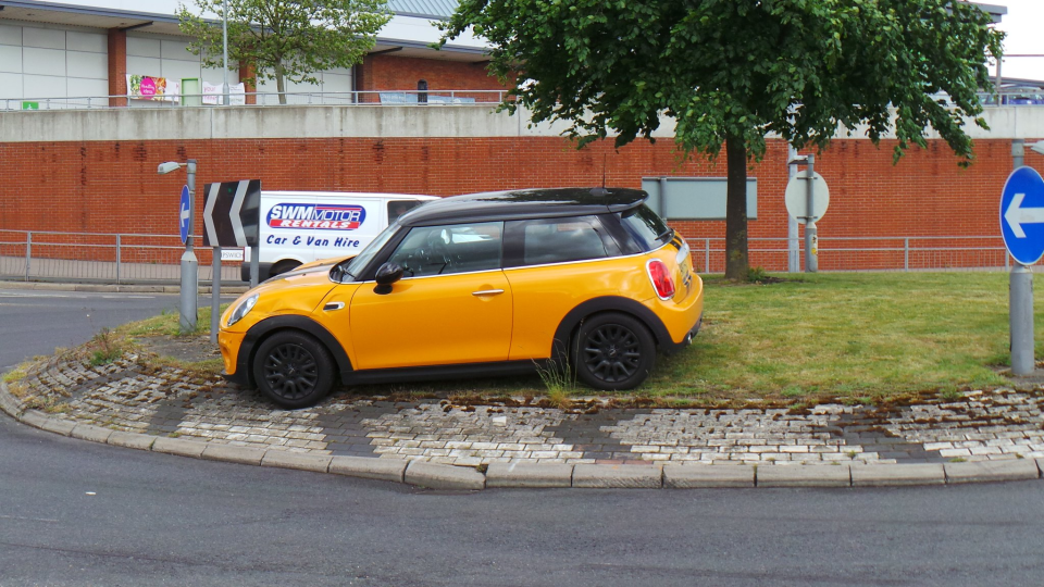  No one is telling this Mini driver to make a U-Turn on his park