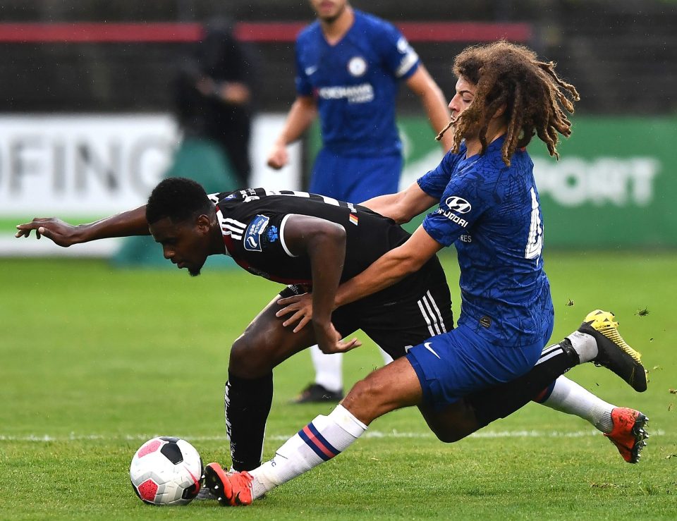  Ampadu crashes into a challenge during a pre-season friendly against Bohemians