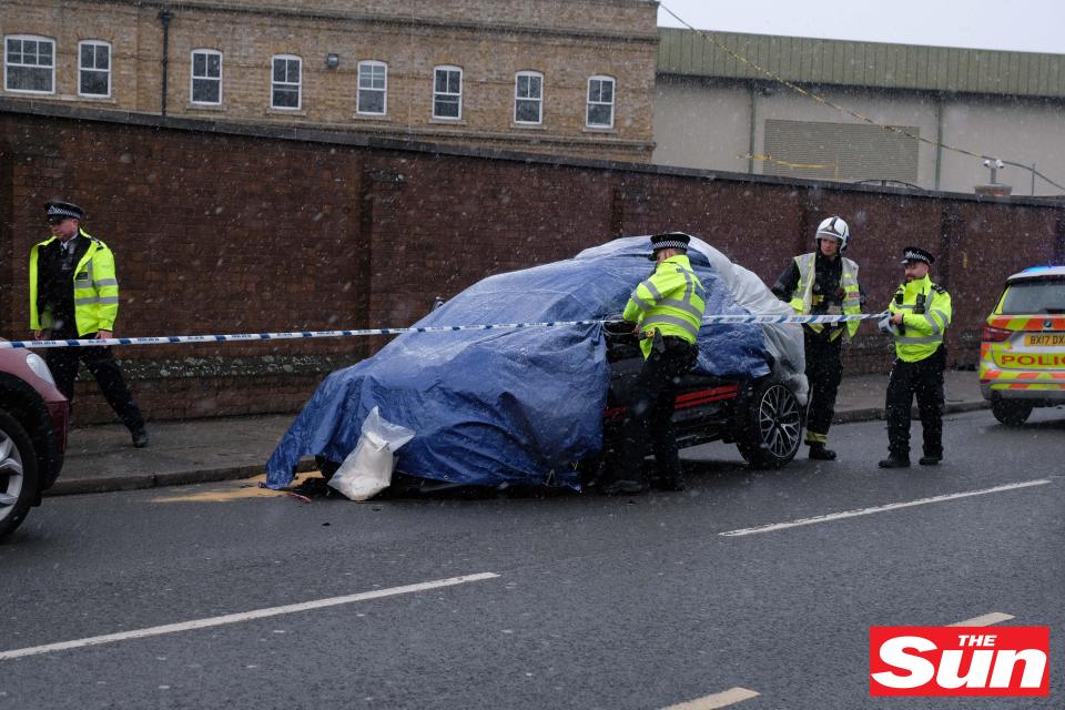  Cops cordon off the wrecked Mini Ant was driving in Richmond