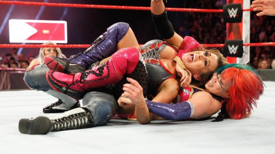  Asuka traps Mickie in the Asuka lock