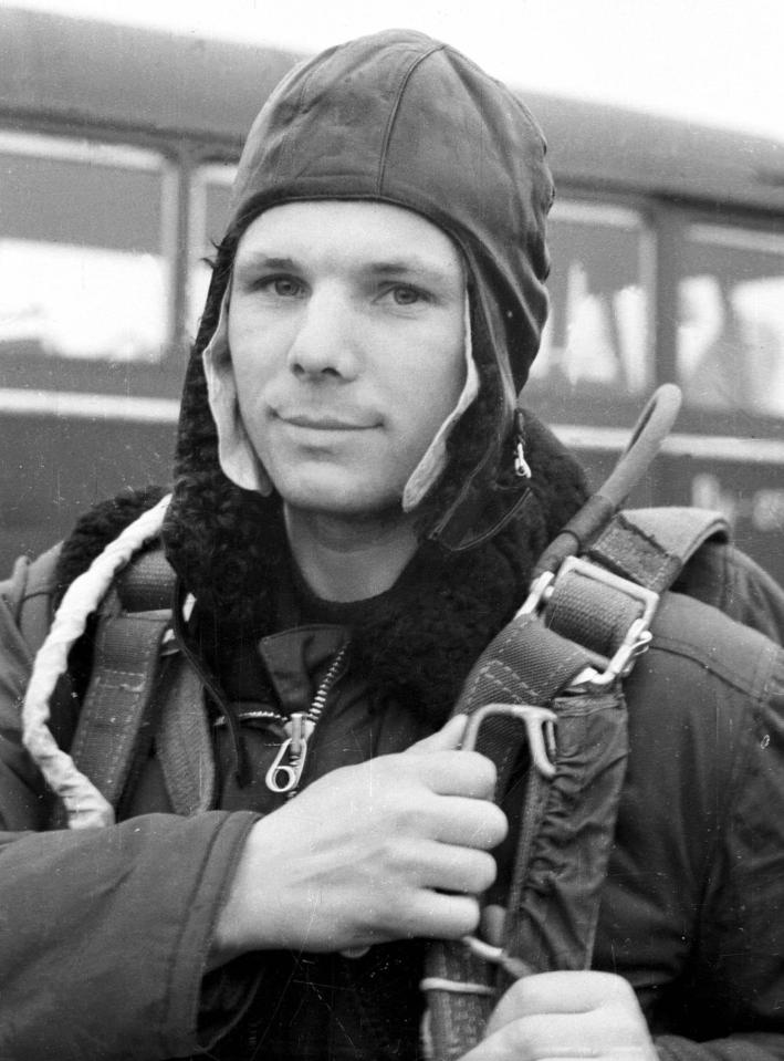  First Soviet cosmonaut Yuri Gagarin holds his parachute during training near Kirzhach, Russia. Wild rumours still surround the events of his death