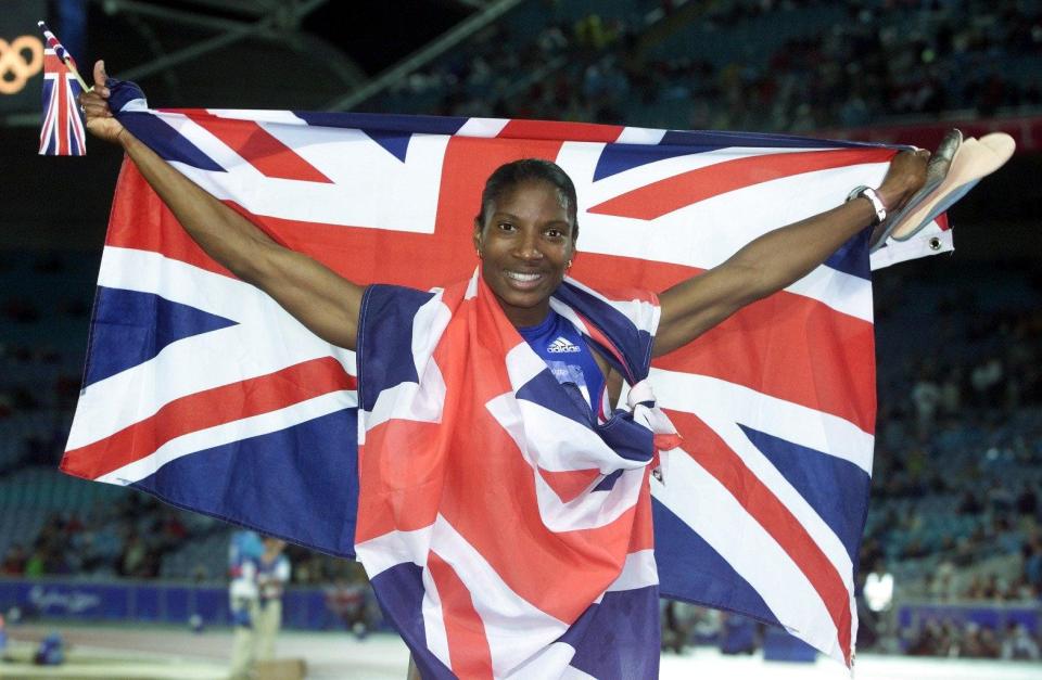  Denise Lewis celebrates her gold medal at the Olympic Games in Sydney