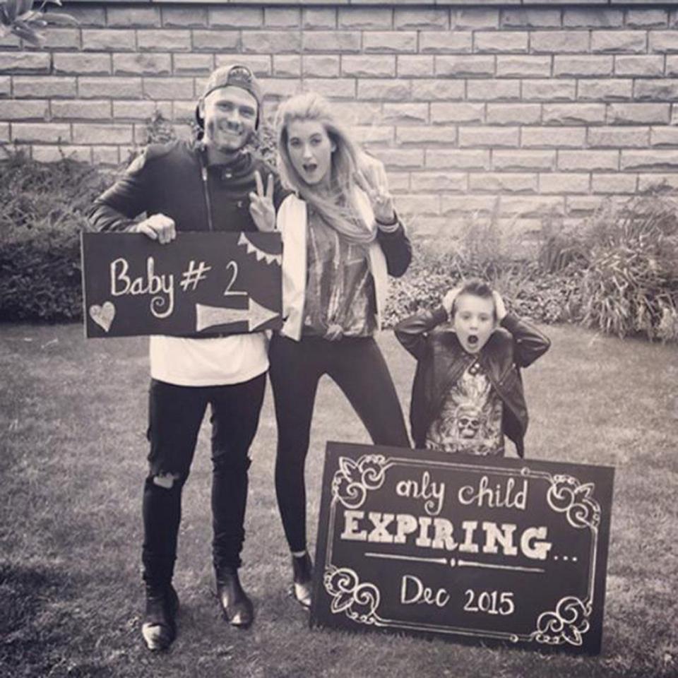  Charley and Matthew also have a seven-year-old son Buster - here helping his parents announce the news of his little brother