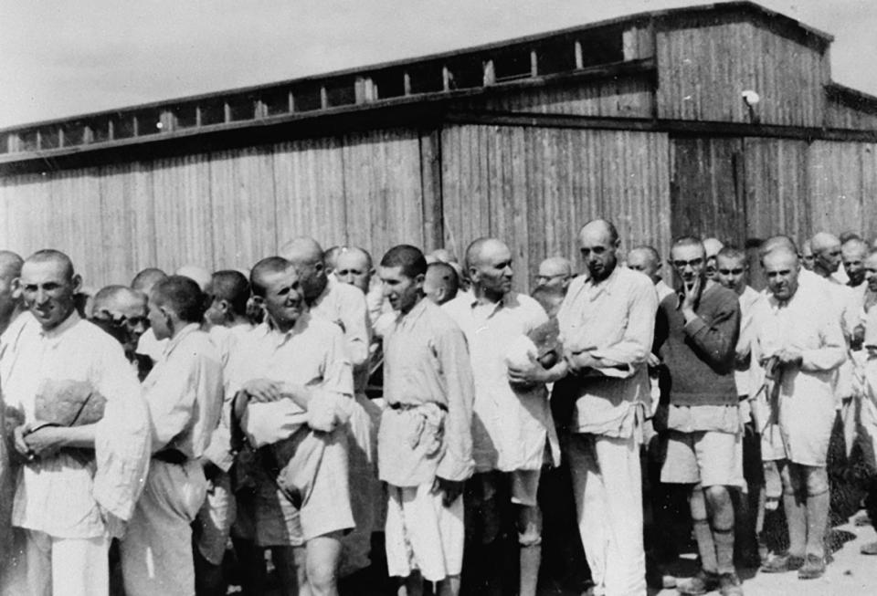  Jewish men file past after being separated from their families in Auschwitz-Birkenau concentration camp