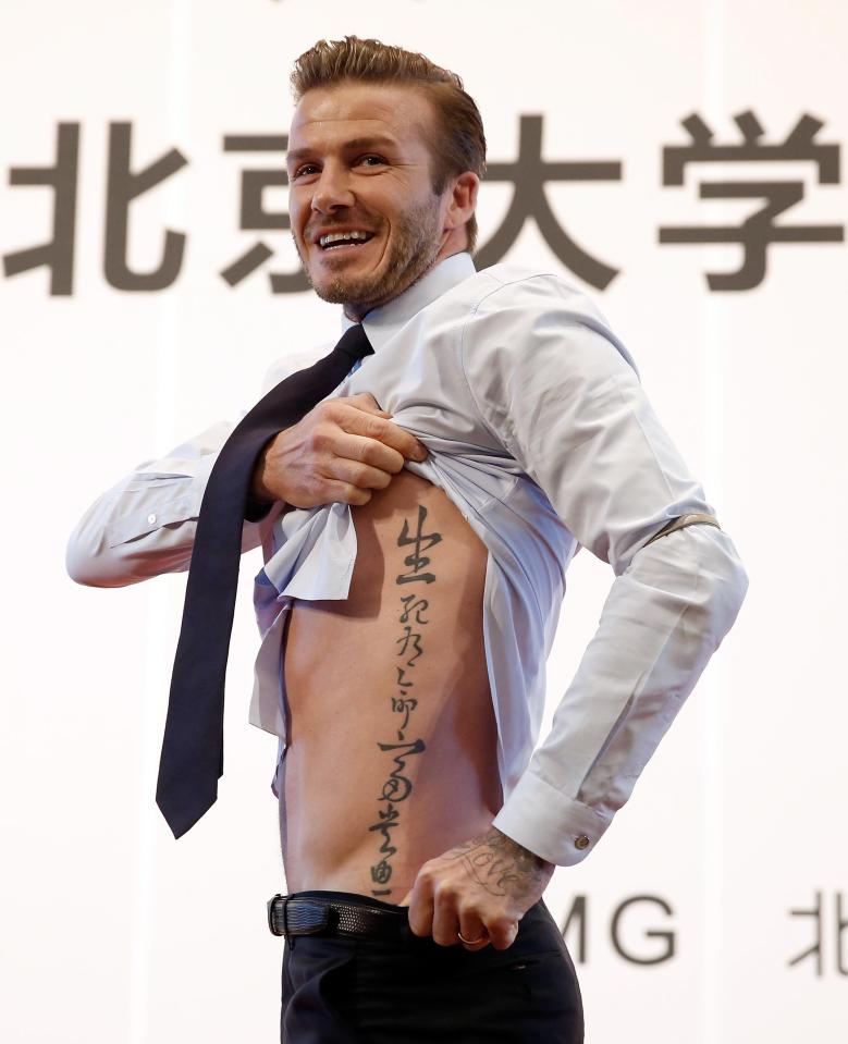  David Beckham shows off his tattoo - written in Chinese - back in 2013