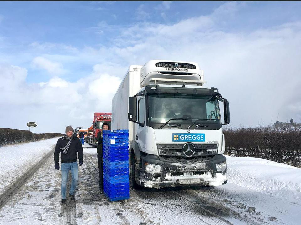  Greggs lorry driver Jon Gowing has been thanked for handing out cakes, pasties and doughnuts to stranded drivers on the A1