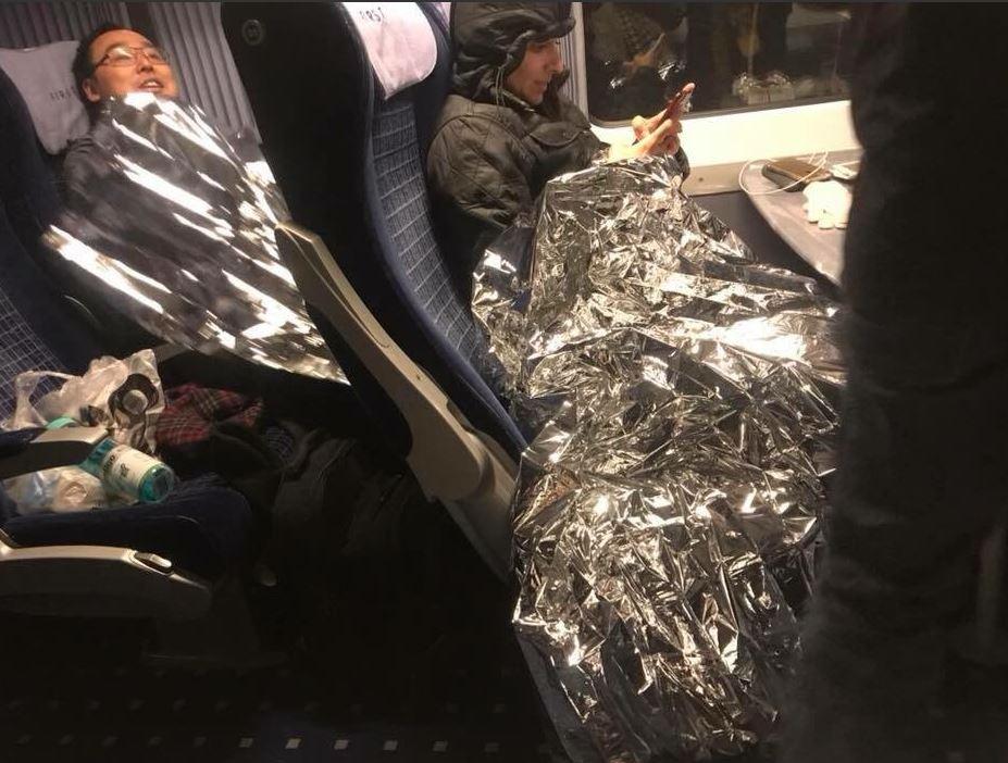  Passengers slept in foil blankets on the service as snow blanketed the country