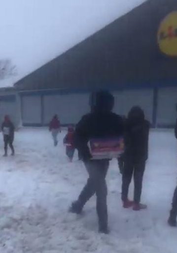  Earlier looters had cleared the shelves at the storm-damaged branch