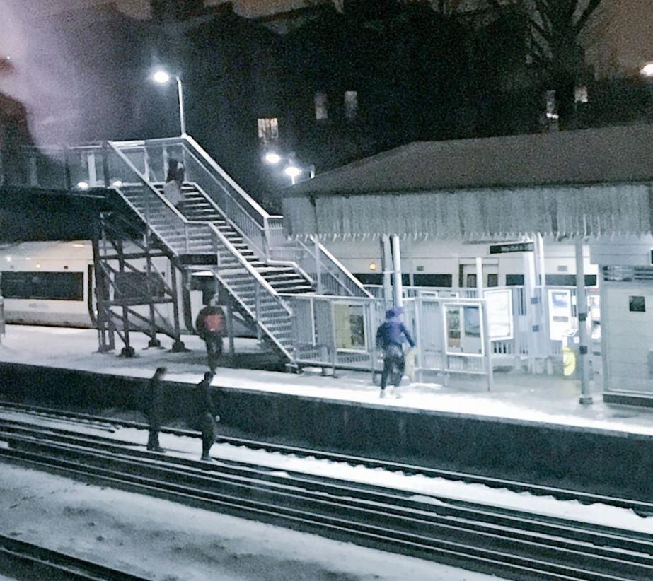  Others climbed across live rails to clamber onto empty platforms