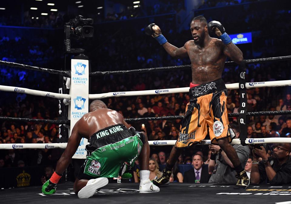  Deontay Wilder retained his WBC world title by dropping and stopping Luis Ortiz