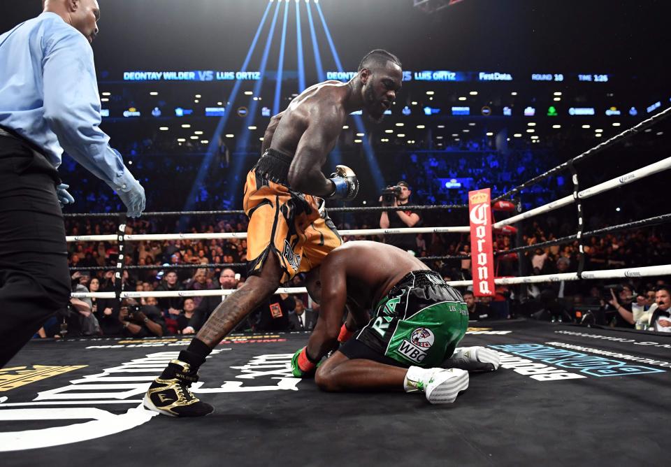  Deontay Wilder stood over the vanquished Luis Ortiz in New York