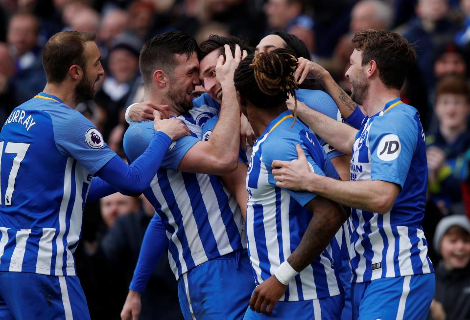  Brighton celebrate taking a two-goal lead early-on against Arsenal