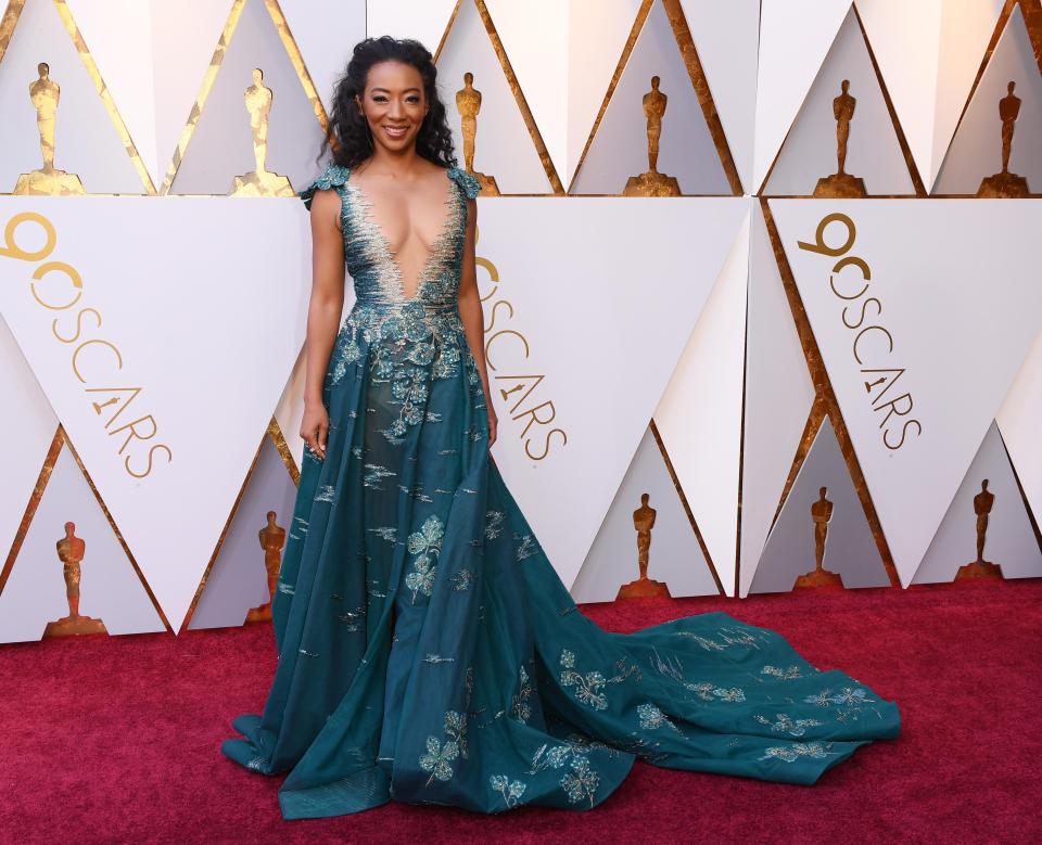  Get Out star Betty Gabriel rocked the extreme cleavage trend in her eye-poppingly low-cut turquoise gown