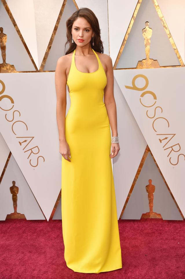  Mexican beauty Eiza Gonzalez looked anything but mellow in her halter neck yellow dress