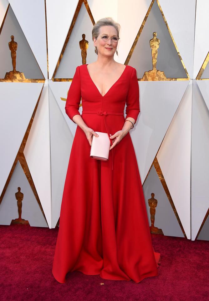  Meryl Streep looked red hot in a scarlet gown, which she accessorised with a light pink clutch