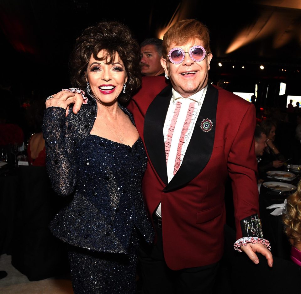  Elton posed with his pal Joan Collins