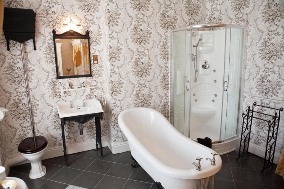  Guests can relax in a classic roll-top bath in the extraordinary hotel