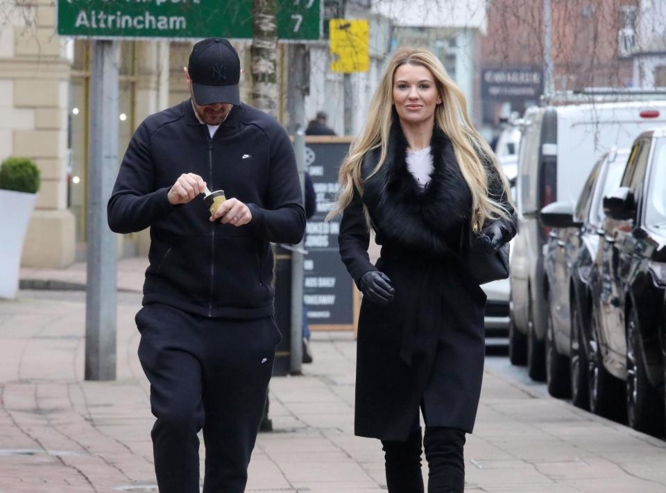  The couple wrapped up warm in matching black outfits