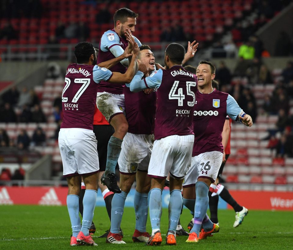  Villa celebrate after James Chester's goal