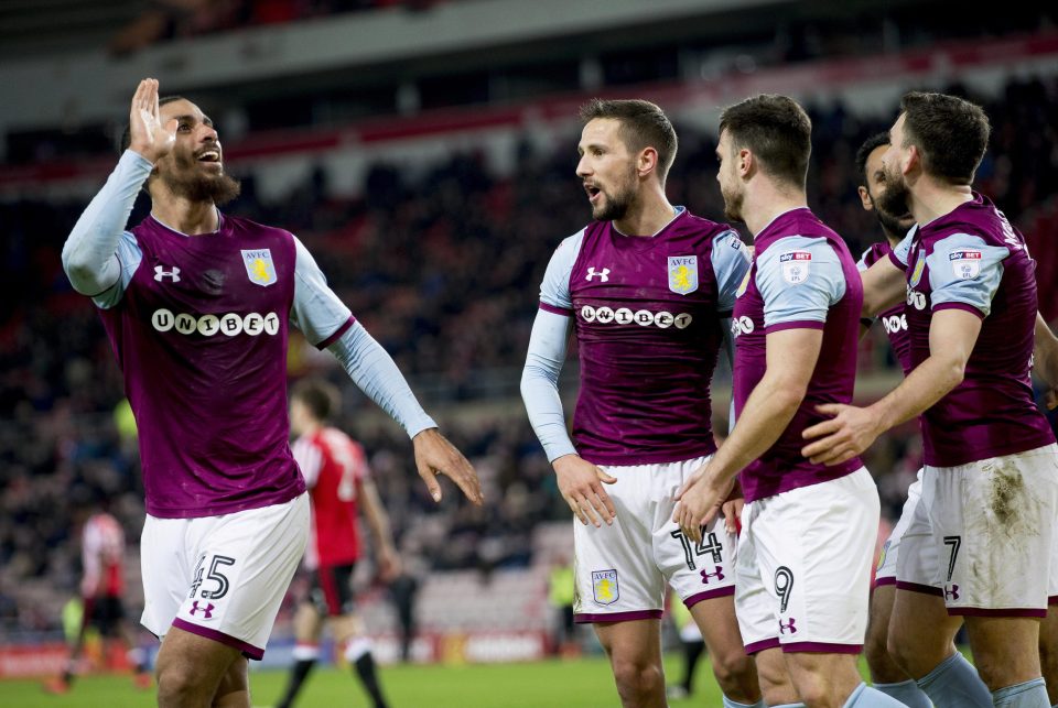  Lewis Grabban (left) celebrates with his team-mates after opening the scoring