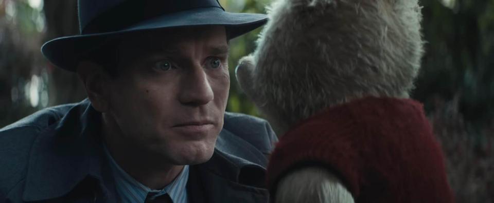  Pooh returns with his friends to help Christopher Robin