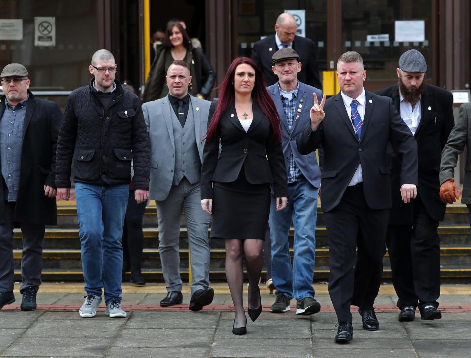  Paul Golding (second right) and Jayda Fransen (centre), leader and deputy leader of far-right group Britain First and supporters upon arrival at Folkestone Magistrates' Court