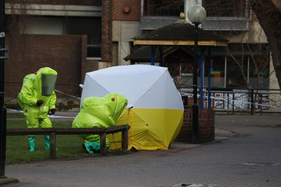 A forensic tent remains around where their bodies were found following the attack