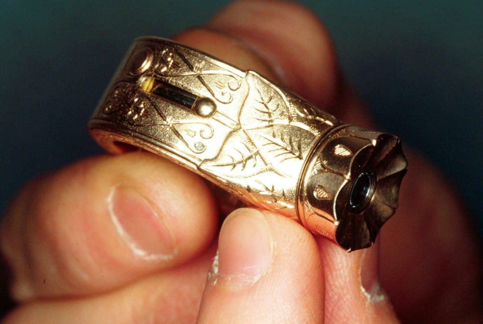  A minute camera hidden inside a gentleman's gold ring