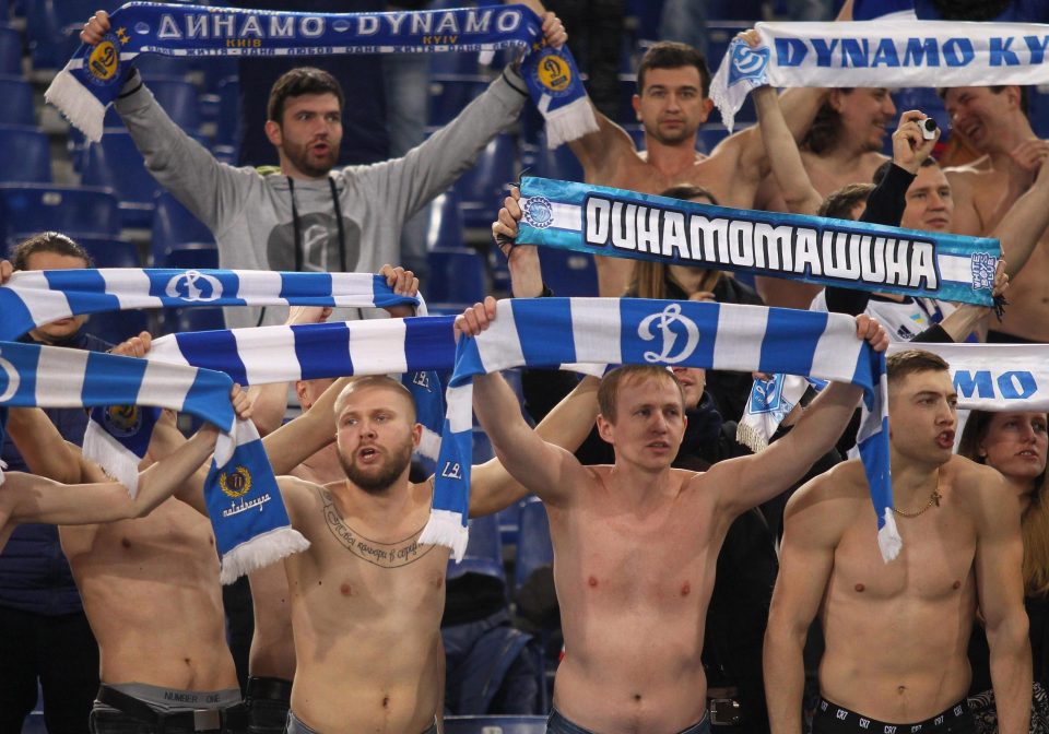  Dynamo Kiev fans celebrate the 2-2 first leg draw in Italy