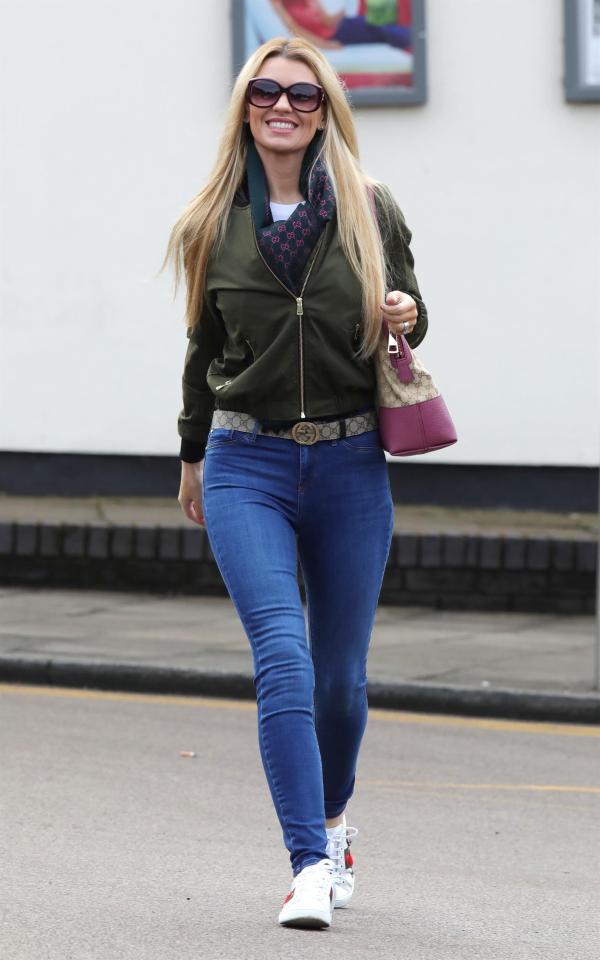  Christine McGuinness looked happy as she stepped out in head to toe Gucci in Cheshire today