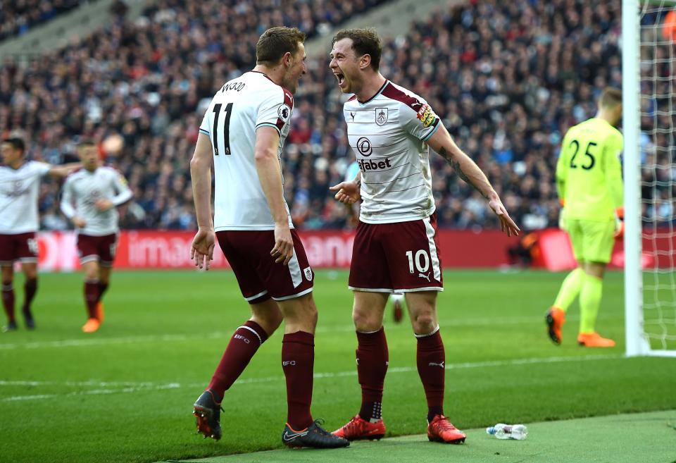  Barnes and Woods celebrate putting Clarets ahead.