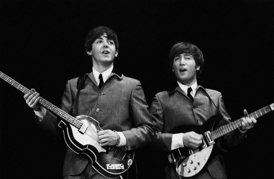  Paul McCartney (left) pictured with Beatles bandmate John Lennon