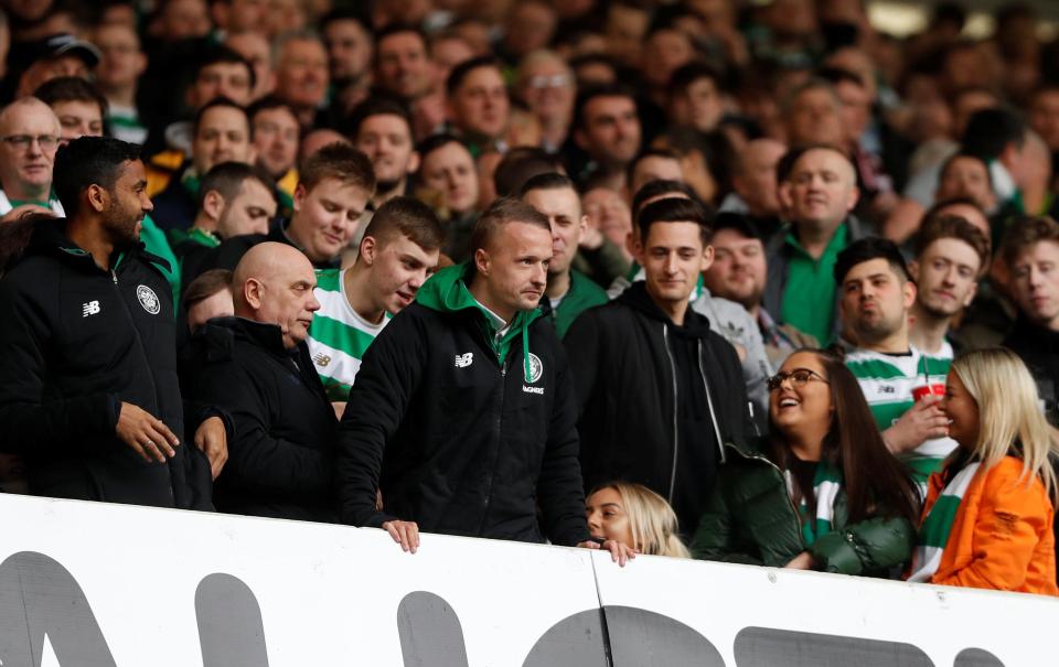  Celtic's Leigh Griffiths gets in amongst the fans during the Old Firm derby- much to their delight