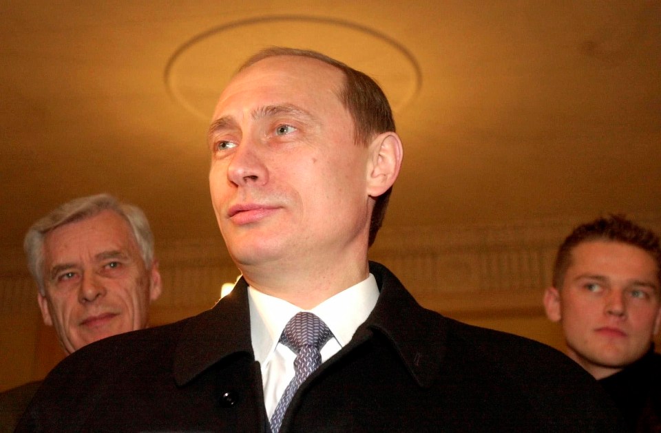 Putin looks chinless in this photo taken when he was acting president in 2000