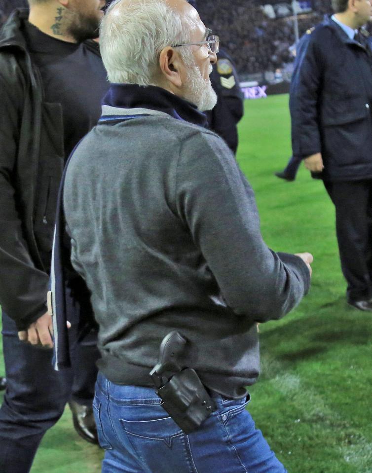  A revolver can clearly be seen in the waistband of PAOK president Ivan Savvidis