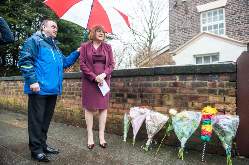  Sir Ken's widow, Anne Jones, 76, paid tribute to her late husband outside the Liverpool legend's home in Knotty Ash