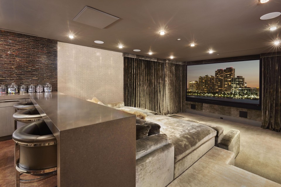 A luxurious home cinema room is included in the gorgeous mansion