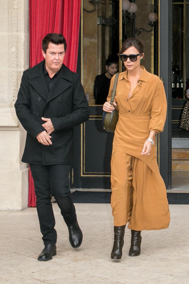  Victoria Beckham has been spotted on a lunch date with the Spice Girls manager Simon Fuller - weeks after she dropped out of the reunion