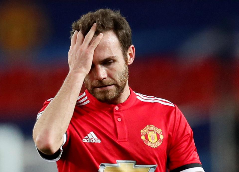  Juan Mata looks devastated after the defeat