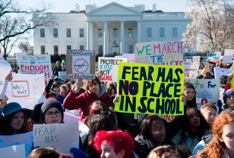  School-aged children protesting gun violence outside of the White House, in Washington, DC