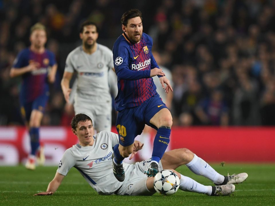  Lionel Messi races away from the Danish defender