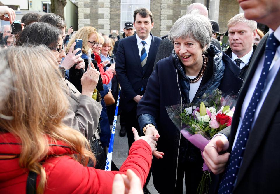  She was warmly welcomed and given flowers by residents of the city