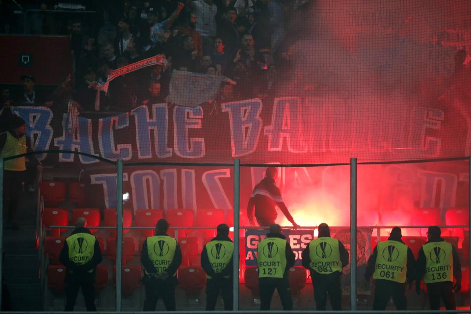  Stewards looked helplessly as fans caused chaos in the stadium